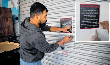  ?? Photo / Dean Purcell ?? Raj and Dharmesh Patel closed the Sumit Dairy on Great North Rd, in Auckland’s Grey, Lynn, as dairies around New Zealand staged a protest.