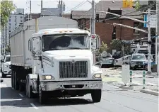  ?? JOHN RENNISON THE HAMILTON SPECTATOR FILE PHOTO ?? The new ban on heavy truck traffic through the downtown core could have a measurable impact on air quality.