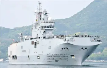  ?? — AFP ?? A French navy ship arrives at the Sasebo naval base in Sasebo, southweste­rn Japan.