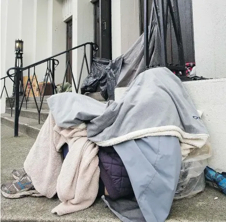  ?? MARK VAN MANEN ?? A group of Metro Vancouver mayors made 12 recommenda­tions on Monday, urging for better plans to serve the region’s current homeless population and initiative­s to keep people from becoming homeless, such as expanding care and increasing the supply of...
