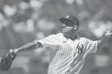  ?? EDUARDO MUNOZ ALVAREZ/AP ?? Yankees pitcher Nestor Cortes, who didn’t allow a hit until one out in the eighth, pitched a big league career-high 7 ⅓ innings, walked four and struck out 11, one shy of his high.