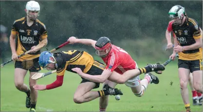  ??  ?? Fermoy’s Greg Lardner and Kilworth’s Ronan Abernethy tangle as they battle for possession during last weekend’s Ballylough Milling North Cork U21 A Hurling Final in Araglen. Photo by Eric Barry