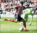  ?? ?? CUSHION: Morgan Gibbs-White scores the second goal