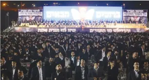  ?? (Marc Israel Sellem/The Jerusalem Post) ?? HUNDREDS OF haredi men attend a mass rally in Jerusalem’s Ramat Eshkol neighborho­od last night staged by the Jerusalem Faction, the largest and most central group behind the campaign of incitement and opposition to haredi IDF enlistment.