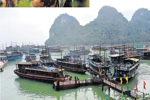  ??  ?? RIGHT Junks await passengers who come to visit the cave on Thien Cung Island, not far from Haiphong in northern Vietnam.