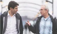  ?? DARRYL DYCK/THE CANADIAN PRESS/FILES ?? Liberal Leader Justin Trudeau chats with South Surrey-White Rock candidate Gordie Hogg in 2017.