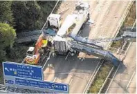  ??  ?? The bridge collapsed on to the lorry seen from above