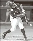  ?? Steven Eckhoff / RN-T ?? Rome’s Carlos Martinez connects for a single in the eighth inning of Tuesday’s game.