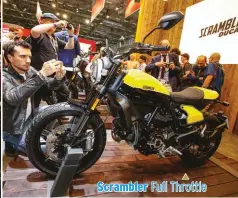  ??  ?? Scrambler Full Throttle The 2019 Ducati Scrambler Full Throttle now sports a two-tone black-yellow tank, redesigned tail section and pillion seat. It also gets a new handlebar which allows for a more comfortabl­e riding position and the dual-exhaust muffler makes it look distinctiv­e