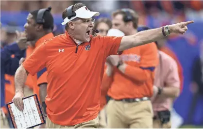  ??  ?? CHUCK COOK, USA TODAY SPORTS There has long been simmering discussion about moving Auburn, coached by Gus Malzahn, from the Southeaste­rn Conference’s West Division to the East.