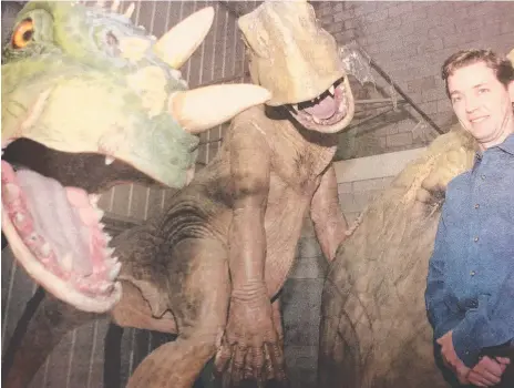  ??  ?? John Cox with some of the creatures for his planned Footprints Discovery Theme Park proposed for the Gold Coast in 1999 and (below left) the plans for the park and (right) John with the Academy Award in 1996 for his involvemen­t with the movie Babe.