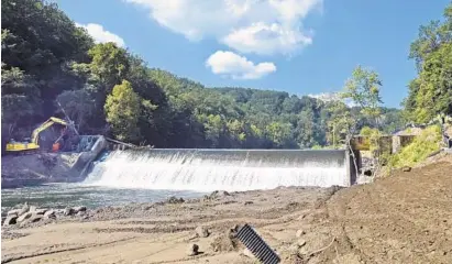  ?? KENNETH K. LAM/BALTIMORE SUN ?? The Bloede Dam is scheduled to be demolished to restore the natural flow of the Patapsco River. The river restoratio­n project is expected to Improve public safety in Patapsco Valley State Park and revitalize fish and wildlife vital to the Chesapeake Bay.