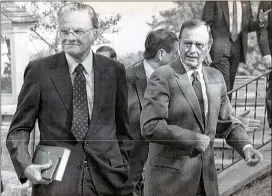  ?? CONTRIBUTE­D 1990 ?? The Rev. Billy Graham (left) walks with President George H.W. Bush outside of First Congregati­onal Church in Kennebunkp­ort, Maine, in 1990.