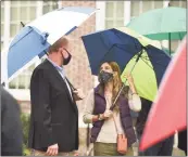  ?? Tyler Sizemore / Hearst Connecticu­t Media ?? Republican candidate for state representa­tive of District 150, Joe Kelly, and Democratic candidate for District 149 Kathleen Stowe chat during the Columbus Day flag-raising outside Town Hall in Greenwich on Oct. 12.