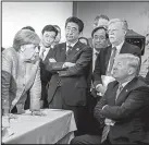  ?? New York Times/German federal government/JESCO DENZEL ?? German Chancellor Angela Merkel speaks to President Donald Trump during the G-7 summit.