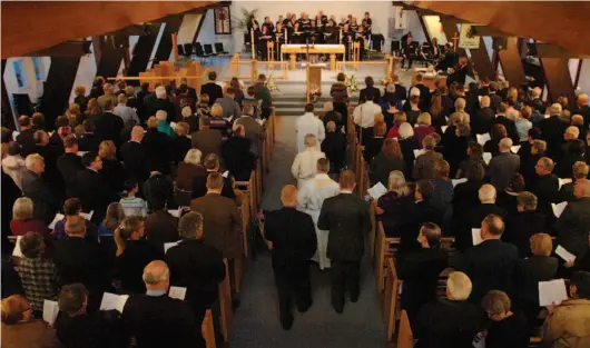  ?? CITIZEN PHOTOS BY DAVID MAH ?? ABOVE: Family, friends, and former colleagues of Anne Martin filled St. Michael’s Anglican church to capacity to pay respect to the longtime community member Saturday. BELOW: A collection of photos touch on a few aspects of Martin’s life.