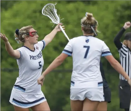  ?? PHOTO BY PAUL CONNORS — MEDIA NEWS GROUP/BOSTON HERALD ?? Franklin’s Kaitlyn Carney, left, celebrates after scoring a goal with teammate Emily Carney against Wellesley during girls lacrosse action Saturday. Host Franklin won, 12-4.