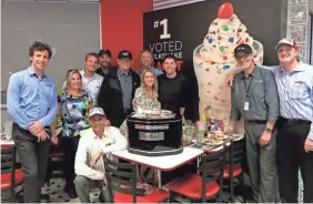  ?? PHOTO COURTESY OF JOE GIBBS RACING ?? Joe Gibbs, Denny Hamlin, family, friends and JGR team personnel ate late Sunday at a Steak ’n Shake.