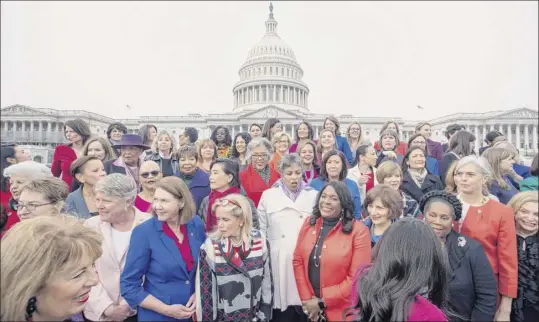  ?? Andrew Harnik / Associated Press ?? House Democratic women members of the 116th Congress gather for a group photograph on Capitol Hill in Washington Jan. 4.