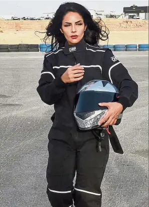  ??  ?? Free to go fast: Rana on the track in Dirab motor park in Riyadh. — AFP