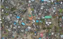  ?? AP ?? Seen from a drone Praia Nova Village, one of the most affected neighbourh­oods in Beira, was razed by the passing cyclone.