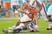  ?? JIM RASSOL/STAFF FILE PHOTO ?? Travis Homer took over last season after Mark Walton got hurt and finished with 966 yards and eight touchdowns.