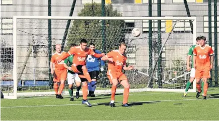  ??  ?? Clearance Graham McClymont clears the danger for Doune Castle