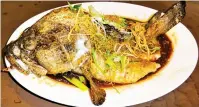  ??  ?? Steamed Whole Grouper, Hong Kong Style