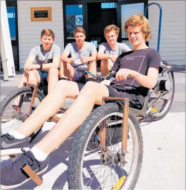 ??  ?? The Katikati College team from left Paul van Loon, Justin Coxhead, Brecon Cameron and Flynn Sunderland race their EV cart in the Waikato Regional finals in Hamilton this weekend.