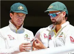  ?? GETTY IMAGES ?? Heat is on: stand-in skipper Paine (left) with Lyon yesterday