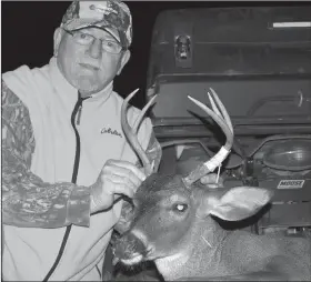  ?? Arkansas Democrat-Gazette/BRYAN HENDRICKS ?? Mike Romine of Mabelvale got his 2019 deer season off to a successful start Tuesday by taking this 6-point buck near dusk.
