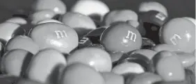  ?? CHARLIE RIEDEL/AP ?? Early last year, M&M’s gave the mascots more unique personalit­ies and a new look. The brand also introduced a new purple M&M.