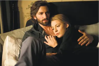  ?? Diyah Pera / Lionsgate ?? Blake Lively ( right) plays Adaline, a 107- year- old woman who never physically ages past 29 and who falls in love with Michiel Huisman’s ( left) character Ellis Jones, a San Francisco Internet billionair­e.
