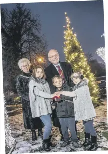  ??  ?? Coun Jean Chaplow, Chairman’s Consort; Jorja Stonebank, Coun Bill Kellett, Chairman of Durham County Council; Harley Jay Stonebank and Lasey Stonebank. switch on Durham’s Christmas lights.