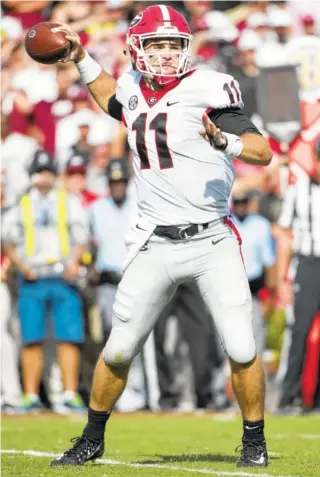  ?? AP FILE PHOTO/SEAN RAYFORD ?? Georgia sophomore quarterbac­k Jake Fromm has completed 72.5 percent of his passes through four games as the No. 2 Bulldogs prepare for this week’s visit from Tennessee.