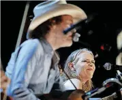  ?? [AP FILE PHOTO] ?? Gillian Welch, right, and Dave Rawlings perform Sept. 16, 2015, at the Americana Music Honors and Awards show in Nashville, Tennessee.