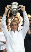  ?? JULIAN FINNEY/GETTY IMAGES ?? Denis Shapovalov holds up the trophy after beating Australia’s Alex de Minaur on Sunday.