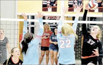  ?? PHOTO BY RICK PECK ?? McDonald County’s Bailey Rickett records one of her 15 kills in the Lady Mustangs 23-25, 25-19, 23-25 Sept. 1 loss to Webb City at MCHS as teammate Mattie Leach looks on.