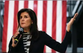  ?? (File Photo/AP/Charlie Neibergall) ?? Republican presidenti­al candidate Nikki Haley speaks to voters Monday during a town hall campaign event in Urbandale, Iowa. Stories circulatin­g online incorrectl­y claim Haley “changed” her name for political reasons.