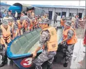  ?? AFP/Getty Images ?? A RESCUE TEAM heads out to search for survivors after a passenger ship sank in China’s Yangtze River.