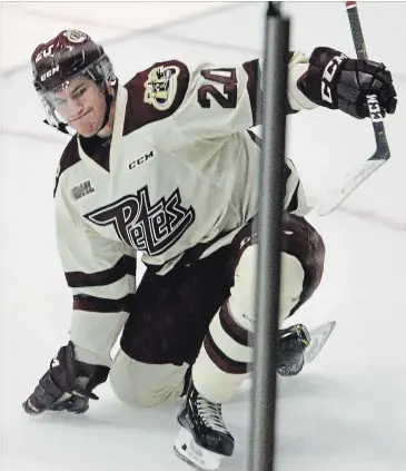  ?? CLIFFORD SKARSTEDT EXAMINER ?? Peterborou­gh Petes' Declan Chisholm celebrates a goal against Sudbury on Oct. 25 at the Peterborou­gh Memorial Centre.