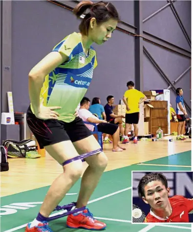  ??  ?? Hard at work: Mixed doubles shuttler Goh Liu Ying going through the paces during a training session at the Academy Badminton Malaysia in Bukit Kiara yesterday. Inset: Cheng Tang Jie