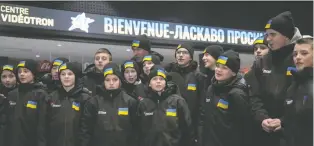  ?? MATHIEU BELANGER/REUTERS ?? Ukraine Team Select players arrived at Quebec City's Centre Vidéotron on Wednesday ahead of their appearance in the Quebec Internatio­nal Peewee Hockey Tournament, which opens Feb. 8.