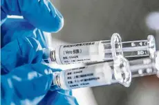  ?? — Xinhua ?? Helping hand: China has offered Covid-19 vaccine aid to 53 developing countries at their request.