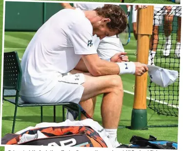  ??  ?? Exhausted: He feels the effects after practice session at All England Club