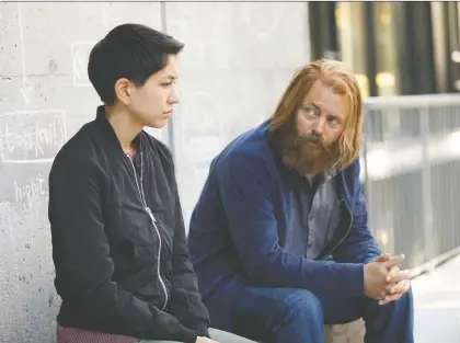  ?? FX ?? Sonoya Mizuno, left, plays software engineer Lily alongside Nick Offerman’s Forest, the enigmatic founder of a high-tech corporatio­n, in Devs.