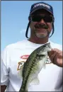  ?? (Arkansas Democrat-Gazette/ Bryan Hendricks) ?? The Kentucky bass inhabits all Arkansas reservoirs and many of its streams. It looks similar to a largemouth but is smaller. Its lateral line is uneven, and its jaw does not extend past the back of the eye.