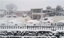  ?? Courtesy: Atif Malik ?? Right: Snow-covered cars in Murree.