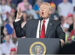  ?? AP ?? President Donald Trump speaks during a rally in support of Rep Greg Gianforte, R-Mont, and GOP Senate candidate Matt Rosendale at the Four Seasons Arena at Montana ExpoPark.