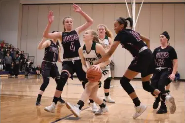  ?? ERIC BONZAR — THE MORNING JOURNAL ?? Elyria Catholic’s Julia Allegretto (2) is fouled by Wellington guard Jalen Gibbs (10). Allegretto and the Panthers are excited to be playing in a regional final.
